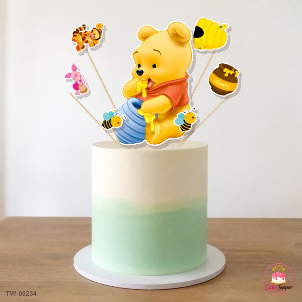 Winnie the Pooh Topper Sheet 05 on a cake